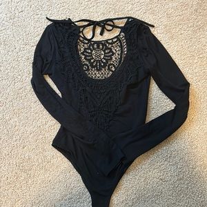 Lace long sleeve open back body suit